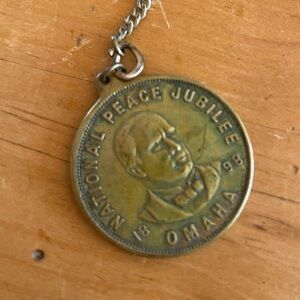 Antique watch chain with 1898 National Peace Jubilee Omaha coin